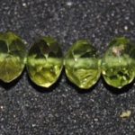 Peridoto rondel facetado 6 mm.
