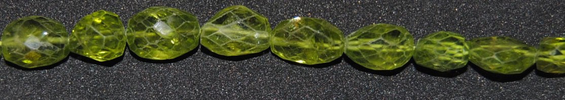 ps-1816-1816 Peridoto nugget facetado 10*8 mm.(Alta Calidad) - Imagen 1