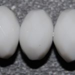 Onix blanco rondel facetado 6*10 mm.
